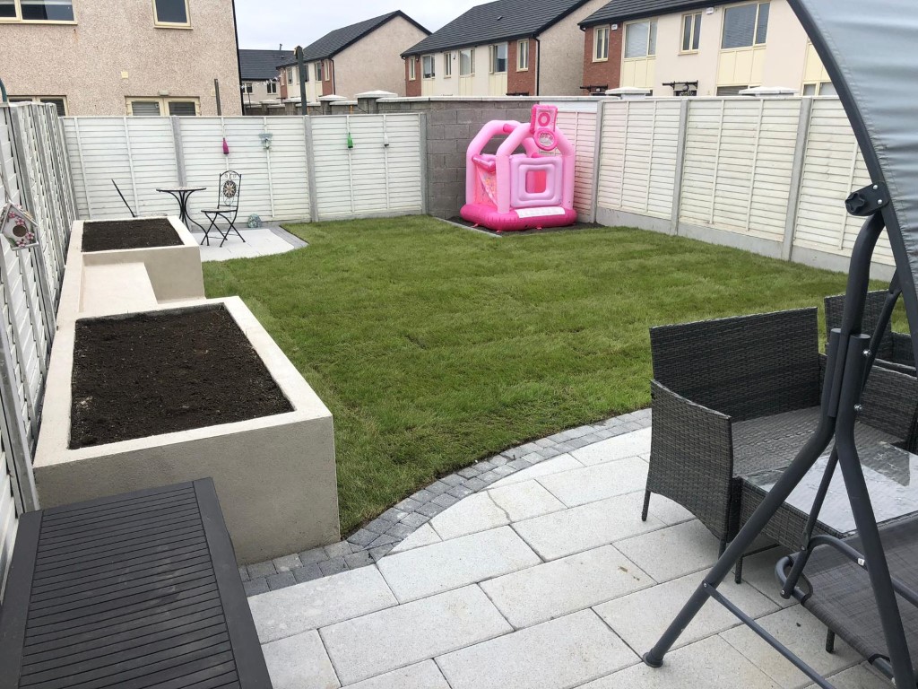 Patio with Raised Flower Beds and New Turf in Blanchardstown, Dublin