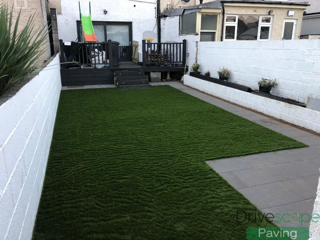 Black Granite Slab Patio with Artificial Lawn in Dublin