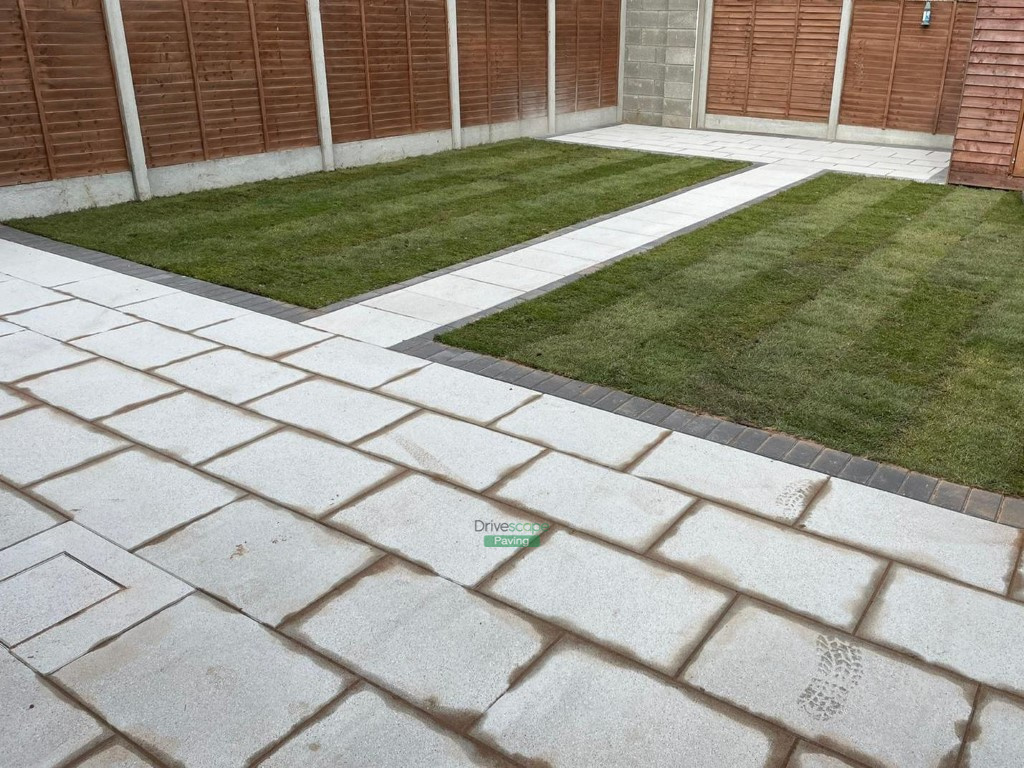 Patio with Newgrange Silver Granite Slabs and Roll-On Turf in Hansfield Wood, Dublin