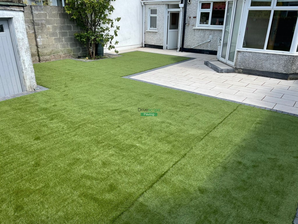 Patio with Quartz Slabs, Charcoal Borderline and Artificial Grass in Blanchardstown, Dublin