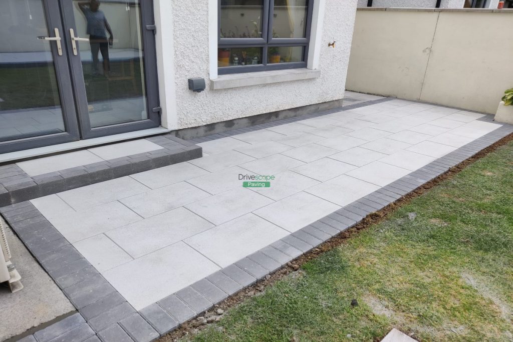 Silver Granite Slabbed Patio with Charcoal Slane Borderline and Step in Leixlip, Co. Kildare