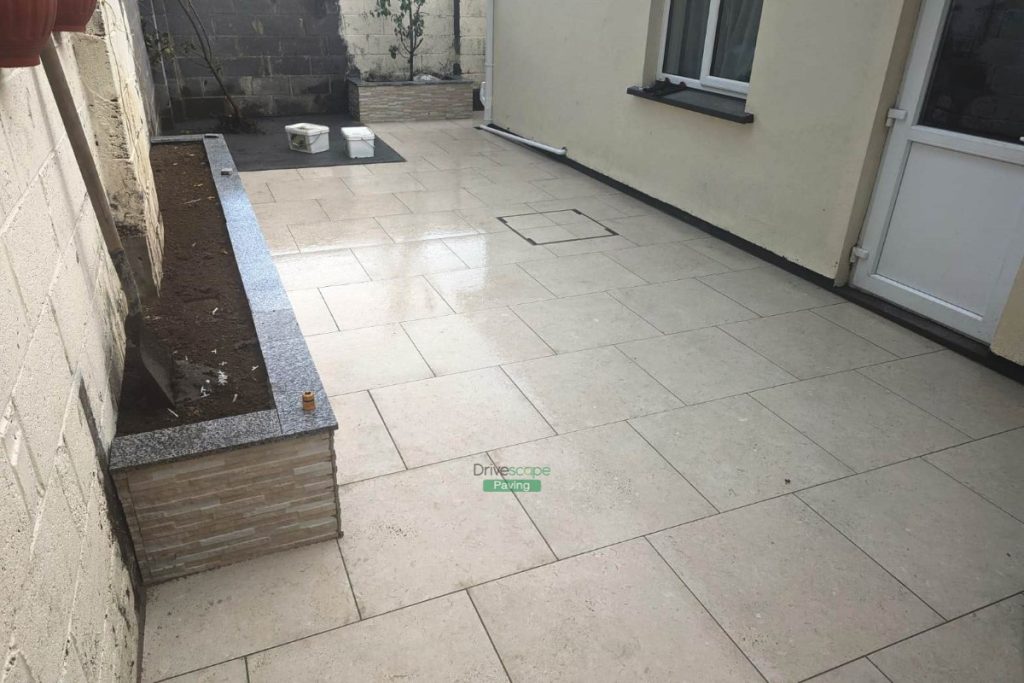 Porcelain Tiled Patio and Raised Flowerbeds with Granite Capping in Lucan, Dublin