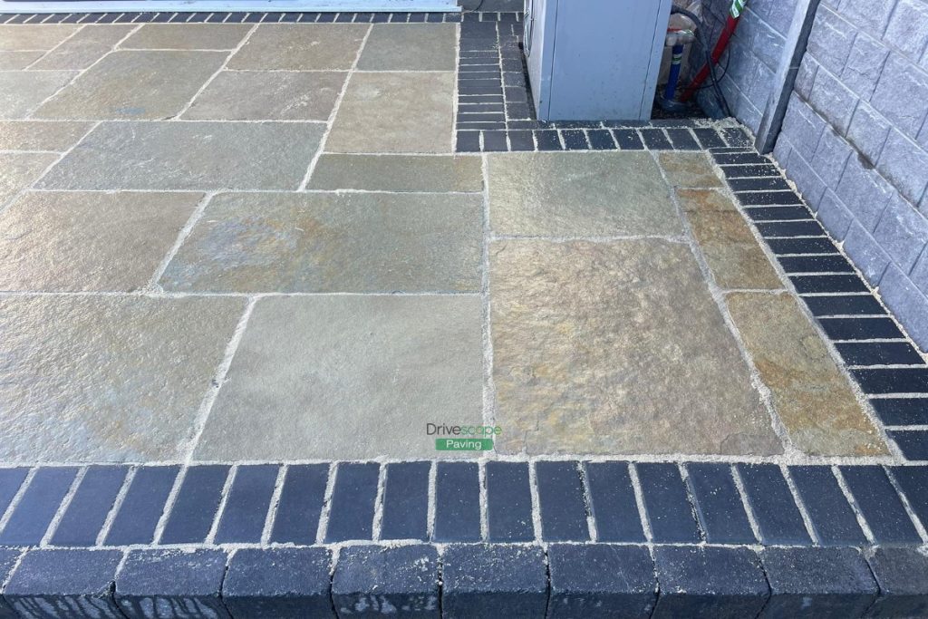 Patio with Tumbled Limestone Slabs and Brick Border in Dunshaughlin, Co. Meath (7)