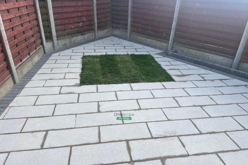 Silver Granite Slabbed Patio with Lismore Kerbing and Concrete Shed Base in Clonee, Co. Dublin