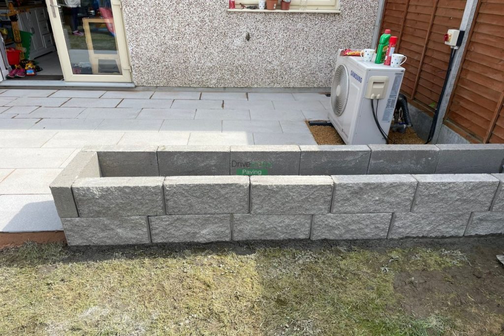 Patio with Silver Granite Slabs and Raised Flowerbeds in Hansfield Wood, Dublin (3)