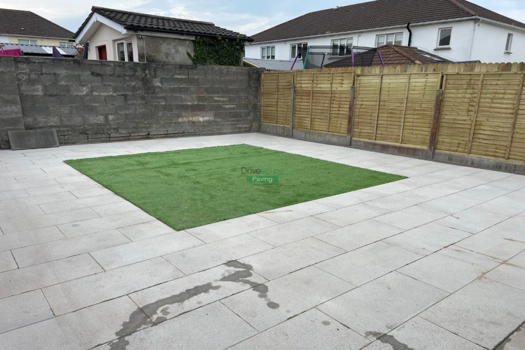 Silver Granite Slabbed Patio with Artificial Grass and Shiplap Fencing in Lucan, Dublin
