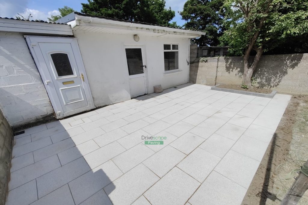 Patio with Silver Granite Slabs and Charcoal Kerbing in Killester Avenue, Dublin