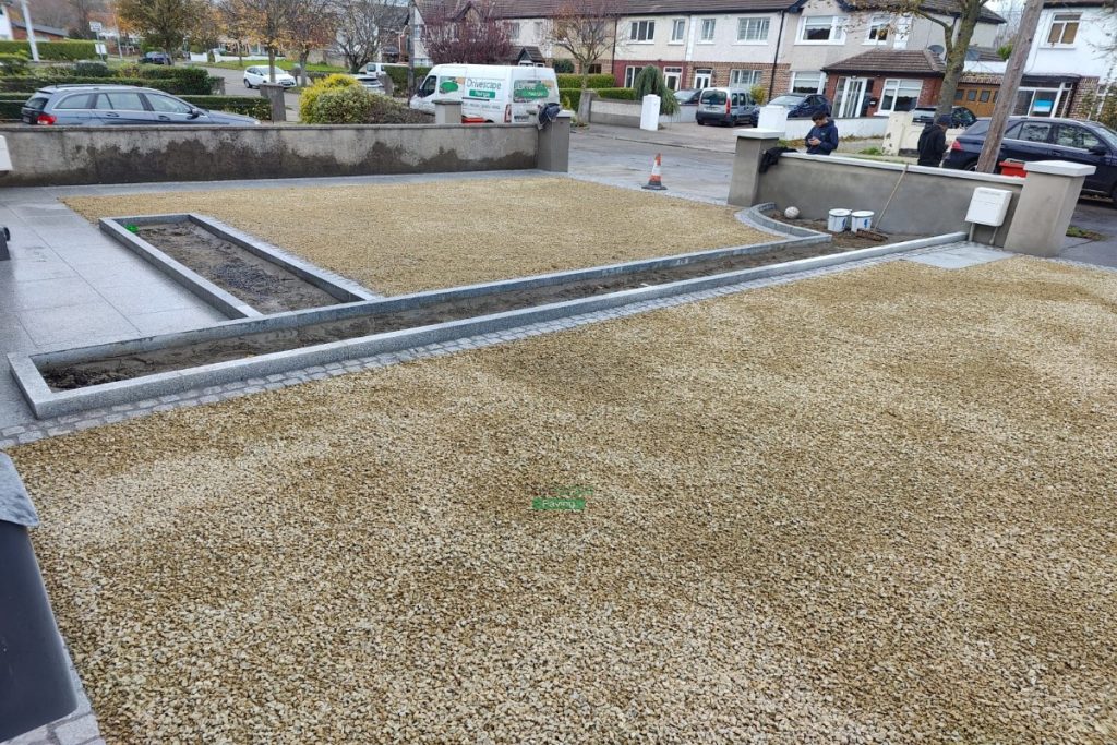 Two Adjacent Driveways with Golden Gravel and Silver Granite Cobblestones in Clontarf, Dublin (12)