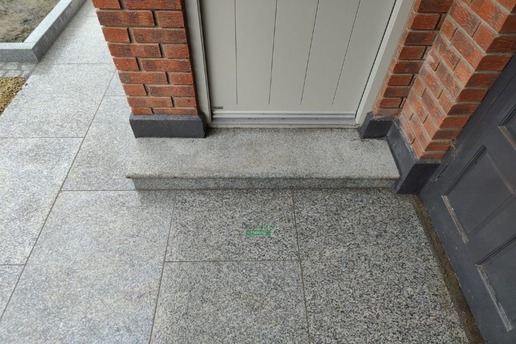 Two Adjacent Driveways with Golden Gravel and Silver Granite Cobblestones in Clontarf, Dublin (18)