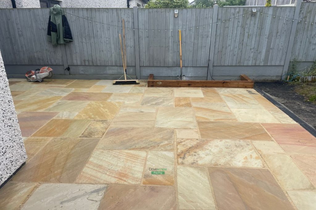 Mint Sandstone Slabbed Patio with Sleepers and ACO Channels in Delgany, Co. Wicklow (12)