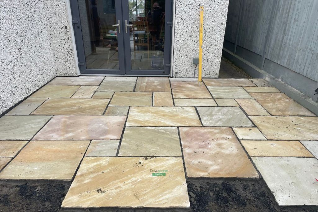 Mint Sandstone Slabbed Patio with Sleepers and ACO Channels in Delgany, Co. Wicklow (6)