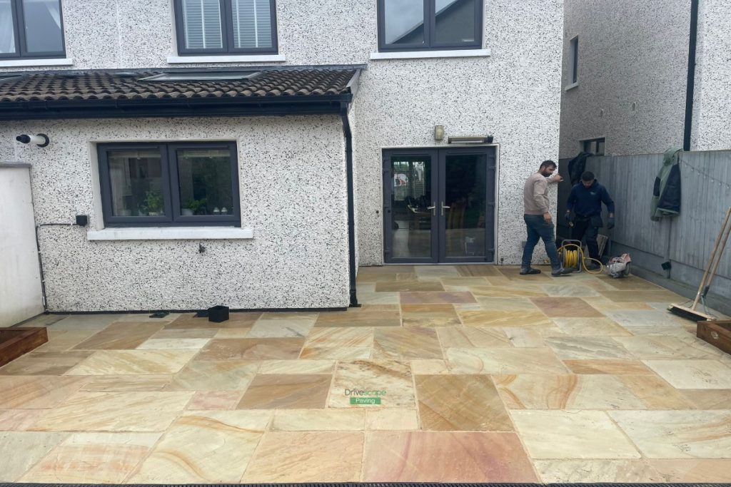 Mint Sandstone Slabbed Patio with Sleepers and ACO Channels in Delgany, Co. Wicklow (7)