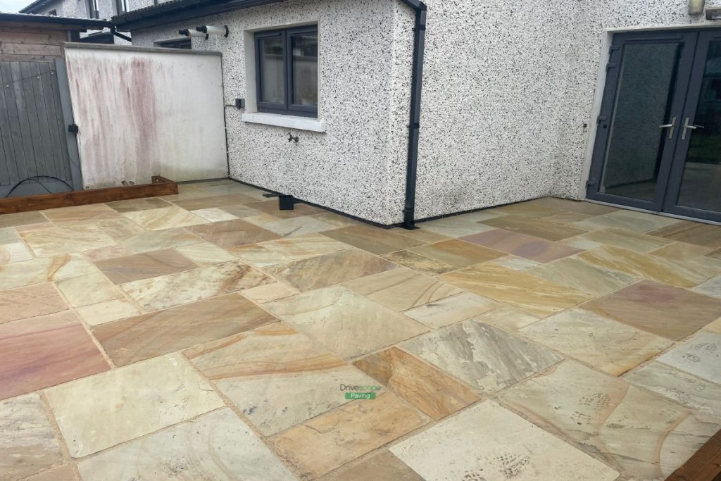 Mint Sandstone Slabbed Patio with Sleepers and ACO Channels in Delgany, Co. Wicklow